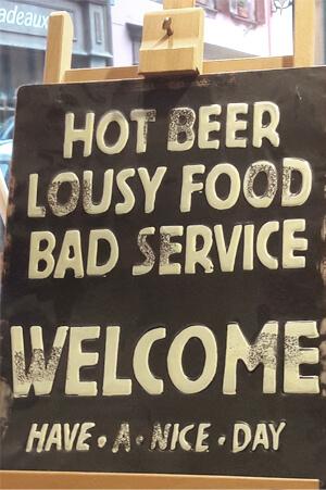 Hot beer, lousy food, bad service, ... welcome, have a nice day.